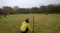 Marking out Botcheston Orchard in the rain 